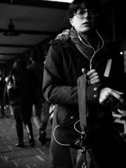 Lady with bag and headphones