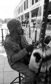 Busker at Pero's Bridge, Bristol