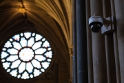 Stained glass window and security camera