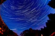 International Space Station and star trails