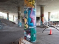 Graffiti column and makeshift ramp