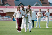 Dennis Lillee being carried off