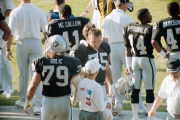 Bob Golic and Howie Long on the sideline